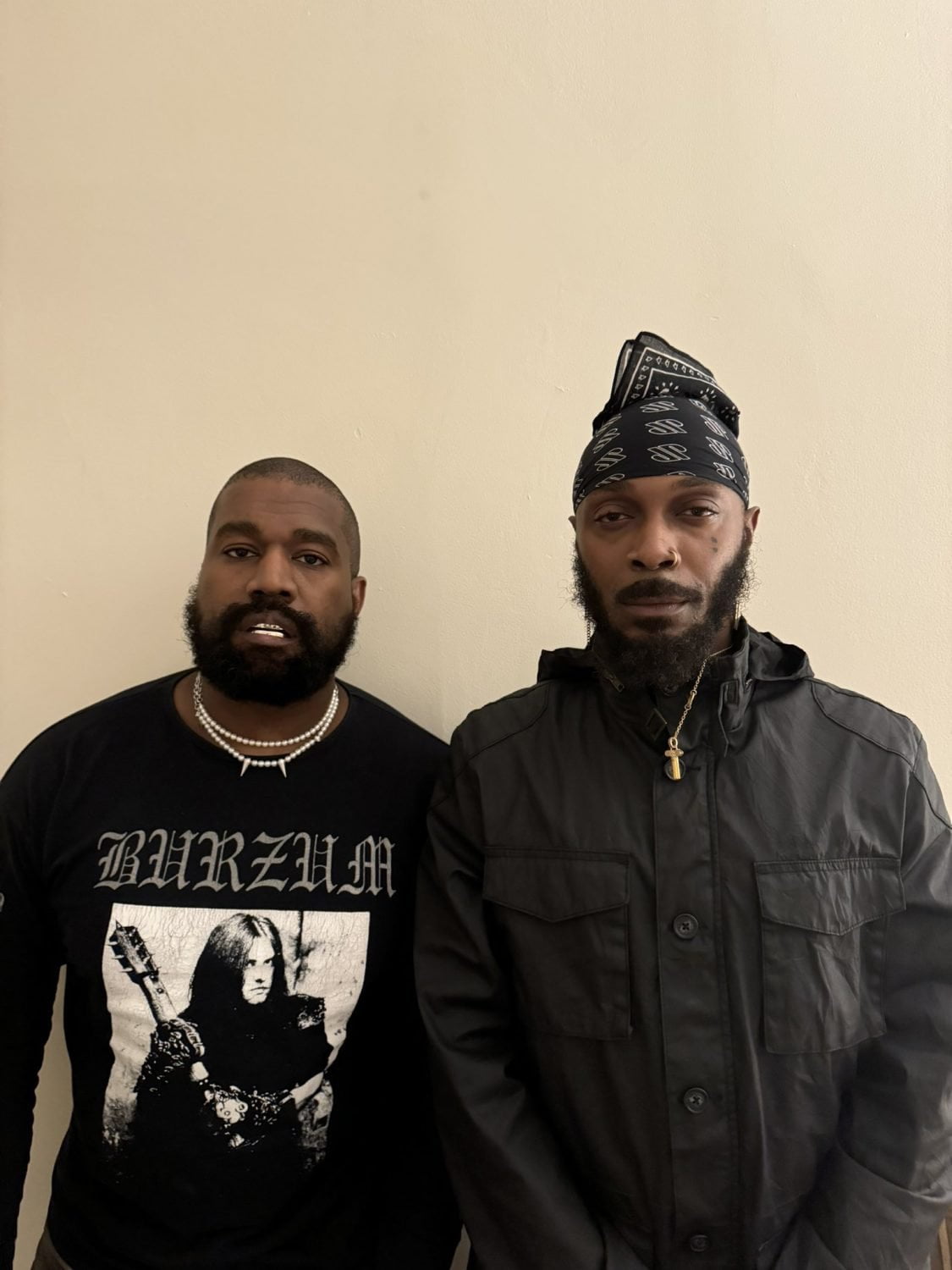 Kanye West with JPEGMAFIA showcasing his new platinum denture